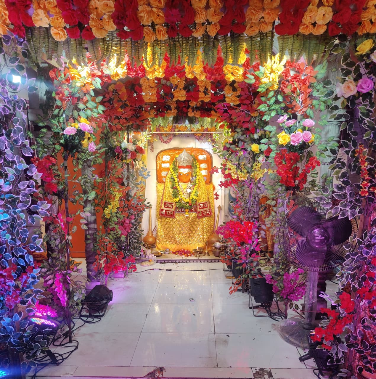 Shri Sote Wale Baba Hanuman Mandir sanctum decorated with flowers